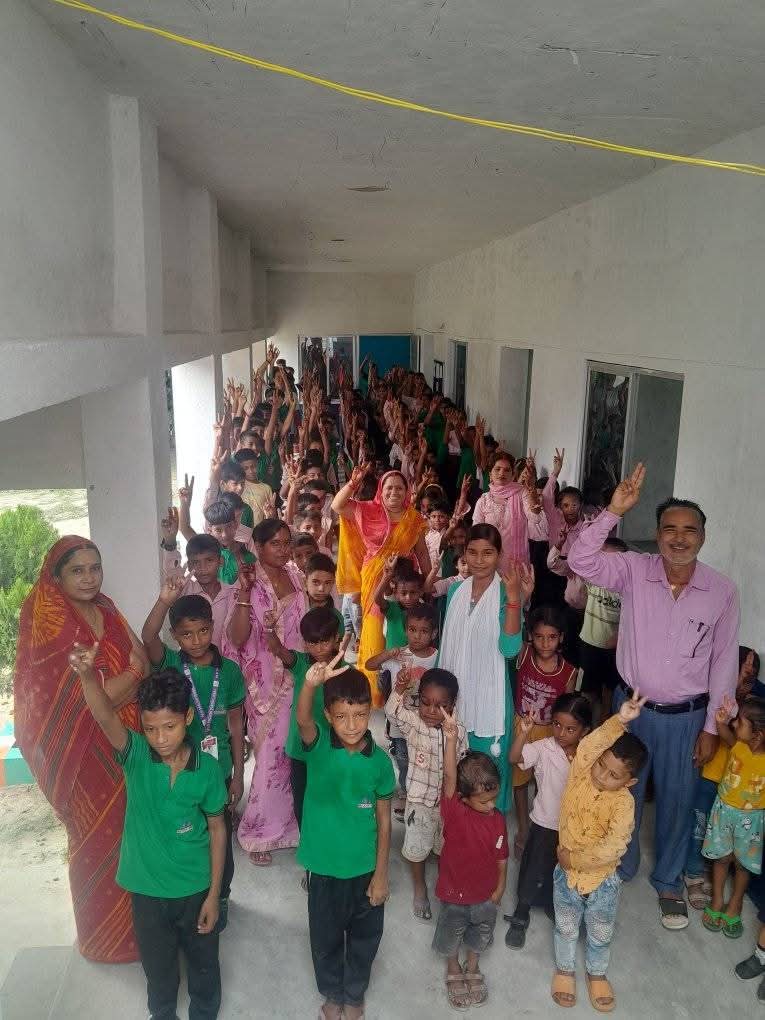 Students and Teachers Cheering in School Corridor
